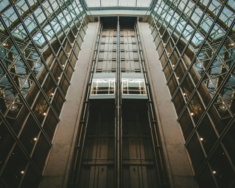 An image of a high-rise building featuring a captivating elevator